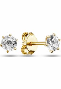 Orecchini a bottone in oro con pietre rotonde in zirconia cubica trasparente, dotati di montature a quattro artigli e chiusura a farfallina.