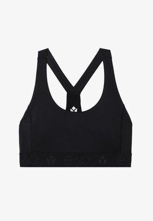 Svart sports BH med stor rund hals, racerback-design og bred elastisk bånd med merkevaren logo og sirkulært mønster.