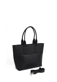 Black tote bag with dual-textured design, featuring a smooth lower half and textured upper, sturdy handles, and detachable strap.