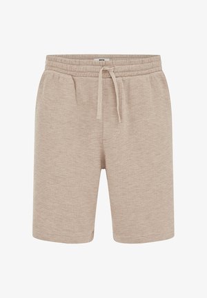 Bézs színű, texturált kötött rövidnadrág gumis derékrésszel és elöl húzózsinórral, térd hosszúságú, hétköznapi stílus.