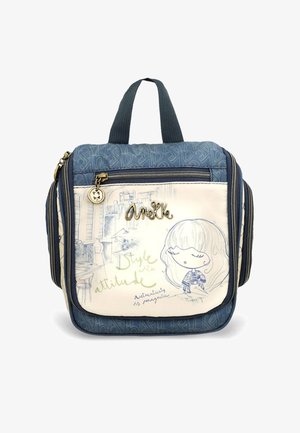 Niebiesko-kremowy plecak z zamykanymi przegrodami, z motywem dziewczynki z kreskówki i napisem. Teksturowany materiał z podwójnymi uchwytami.