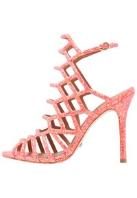 Rosa glittrande högklackad sandal med utskärningsdesign, öppen tå och ankelsnörning med en guldfärgad spänne. Slät innerfoder.
