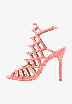 Pink glitter high-heeled sandal with cut-out design, open toe, and ankle strap featuring a gold-colored buckle. Smooth inner lining.