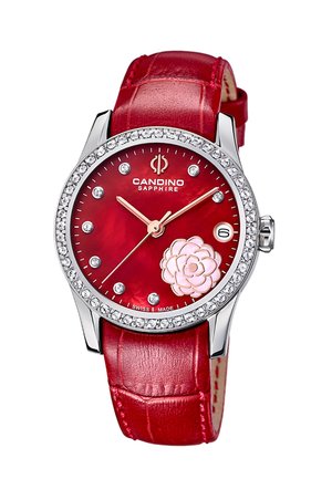 Montre pour femme avec bracelet en cuir rouge, cadran rouge, index heures en cristal, fenêtre de date, motif floral, et lunette argentée ornée de cristaux.