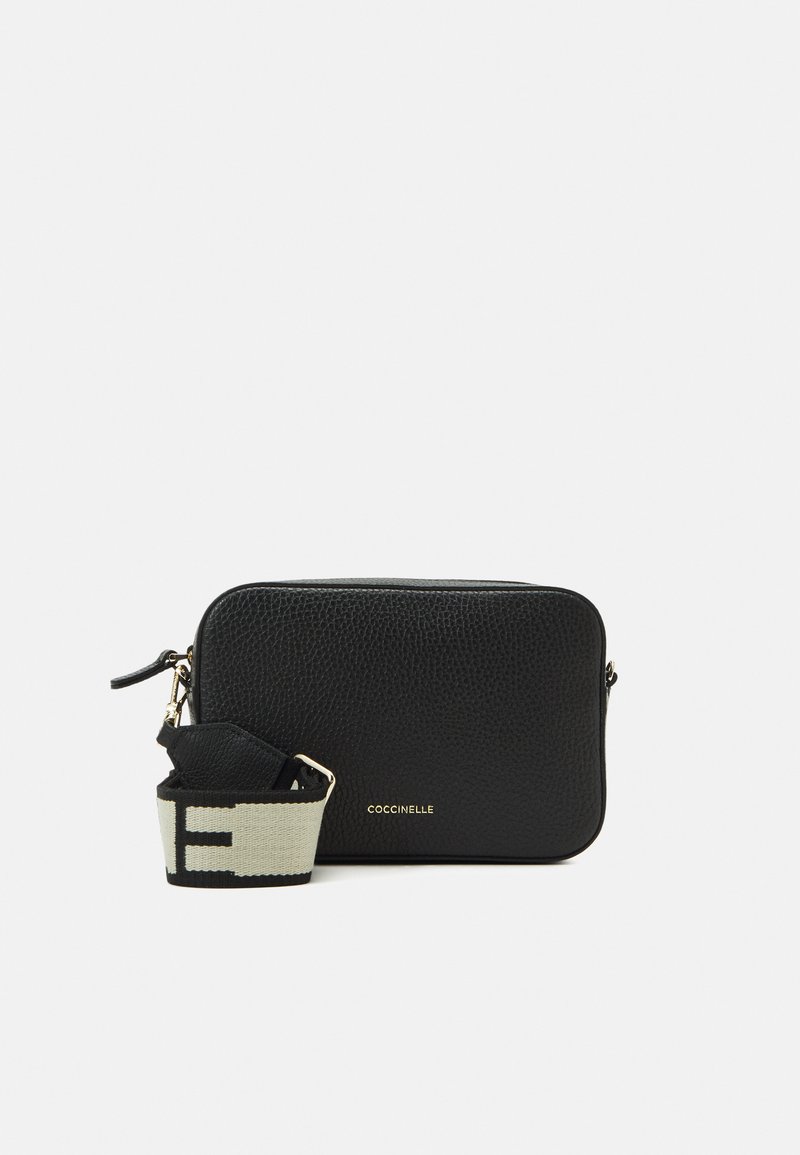 Black leather crossbody bag with a pebbled texture, rectangular shape, featuring a contrasting strap with a graphic pattern and a gold logo detail.
