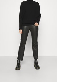 AllSaints Maglione - black