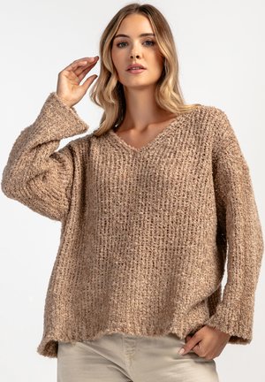 - Sweter
