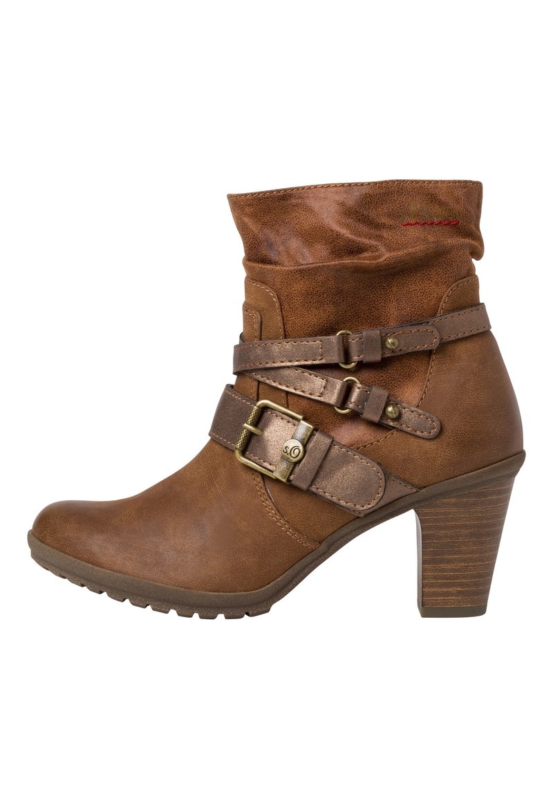 Bottines en cuir marron avec un revers roulé, deux boucles et une surface texturée. Dotées d'un talon haut et d'un design à bout rond.