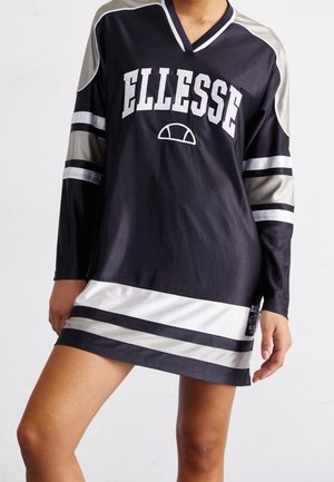 Person wearing a black and gray long-sleeve sports dress with white stripes and "ELLESSE" logo on the chest.