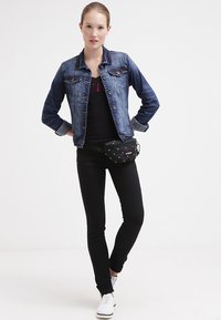 Eastpak SPRINGER Bum bag lill' dot/black Zalando