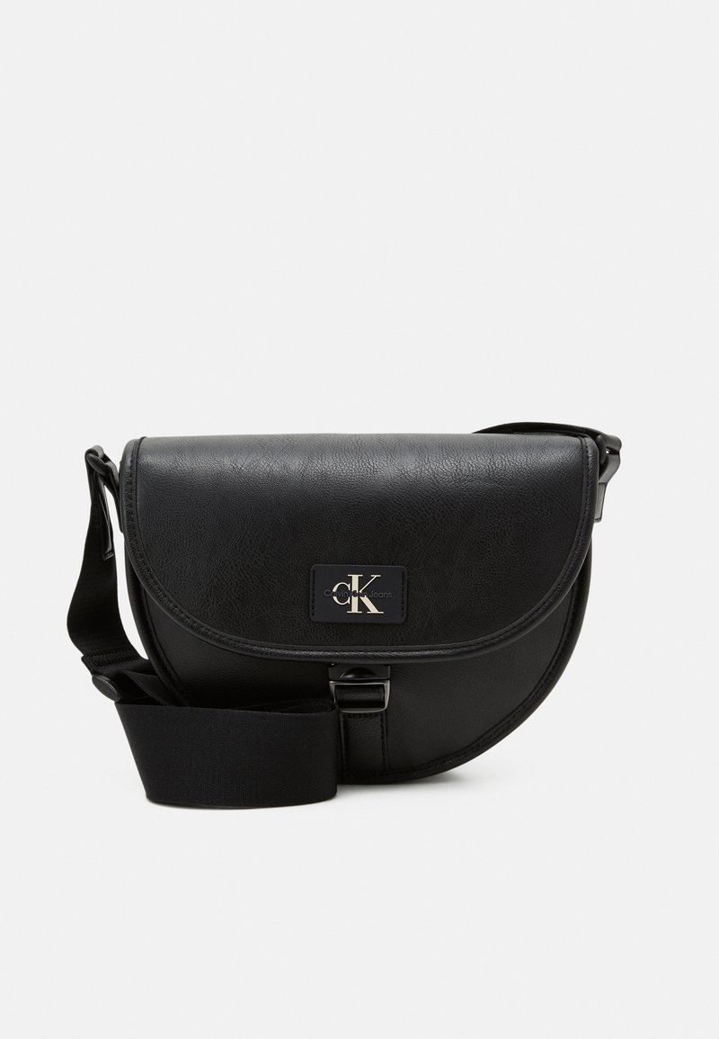 Calvin Klein Jeans TAGGED SADDLE Across body bag black Zalando.co.uk
