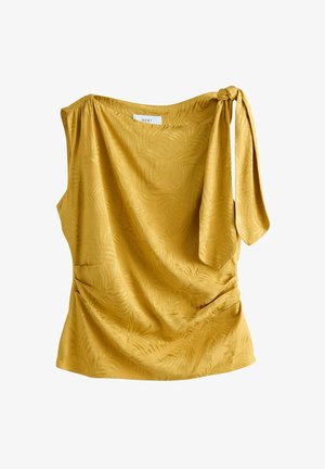 Sennepsgulfarvet top med en design med én skulder, en knyttet detalje på skulderen og teksturerede bladmønstre over stoffet. Blød drapering.