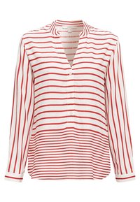 Blouse blanche à rayures verticales rouges, manches longues, col en V, fermeture par boutons, coupe décontractée avec fentes latérales à l'ourlet.