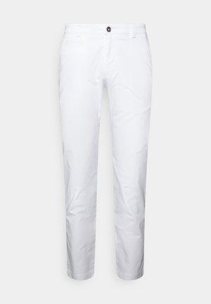 Pantalons blancs en coton à coupe slim, avec une fermeture à un bouton et des poches latérales. Texture lisse, design à jambes droites.