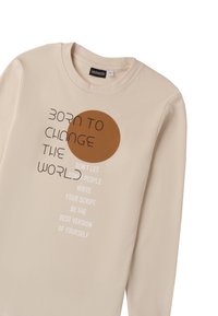 Felpa beige con una grafica rotonda marrone e testo nero. Il testo include frasi motivazionali. Presenta un colletto a girocollo e maniche lunghe.