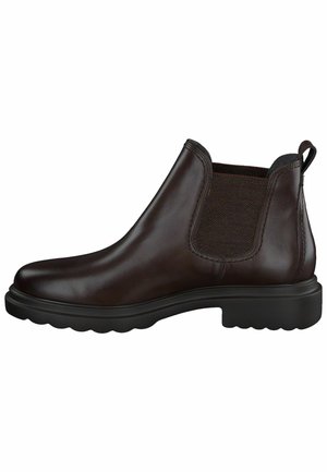 Botín de cuero marrón con paneles laterales elásticos, puntera redonda y suela de goma robusta con ranuras para mayor tracción.