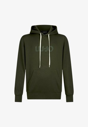 Donkergroene capuchontrui met een buidelzak. Heeft lichtbeige trekkoorden en reliëfmerk op de voorkant. Zachte stoftextuur.