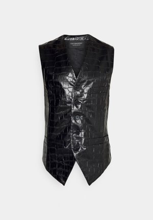 Musta hihaton nahkaliivi krokotiilikuvioinnilla, neljällä napilla ja terävällä helmalla, suunnittelija Viktor & Rolf, Mister Mister -mallisto.