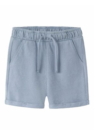 Shorts en coton bleu clair avec taille élastique, cordon de serrage, poches avant et ourlets roulés.