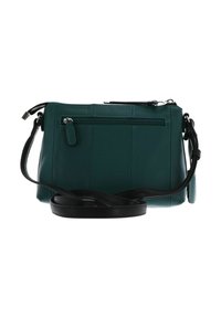 Sac bandoulière en cuir teal avec une finition texturée, doté d'une poche zippée à l'avant, d'une bandoulière noire et d'une fermeture zippée sur le dessus.