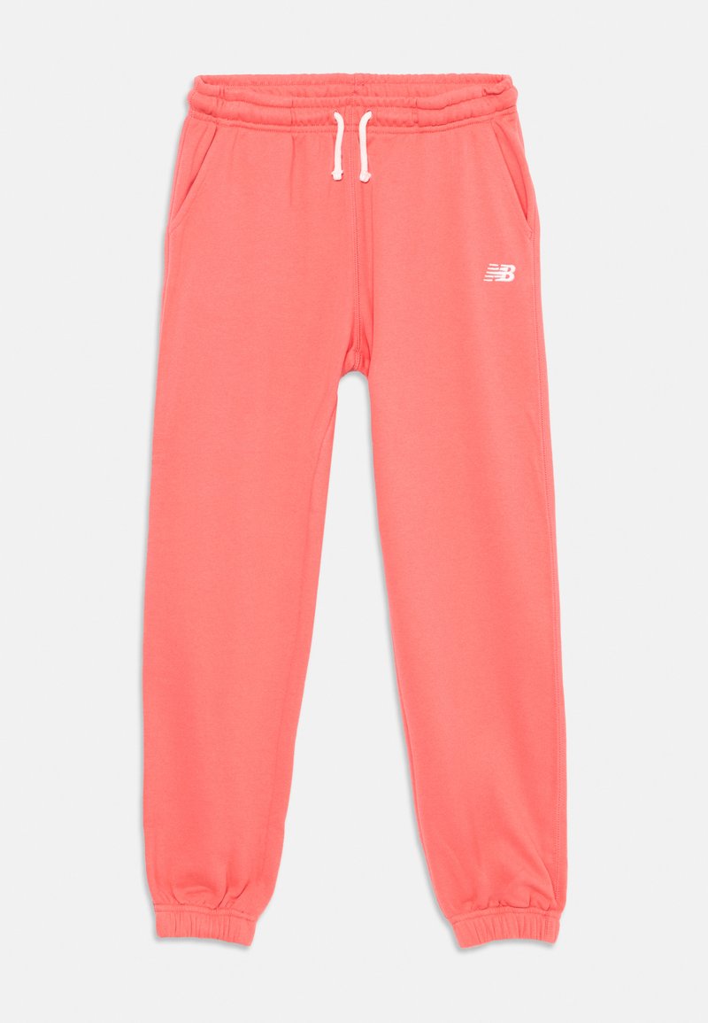 Pantalons jogger en corail avec une taille élastique et un cordon de serrage ajustable. Comprend des poches latérales, des poignets côtelés et un petit logo sur la cuisse.