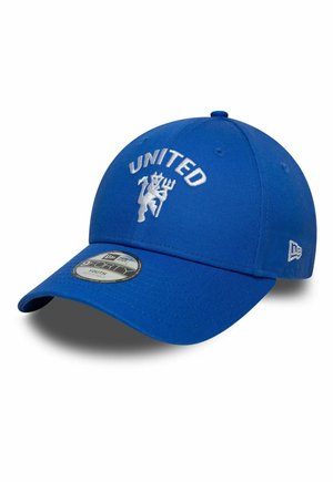 Blue baseball cap with "UNITED" and a white lion holding a trident embroidered on front, with adjustable strap and brand logo on side.