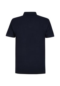 Polo à manches courtes bleu marine avec un motif texturé, un col côtelé et un ourlet droit. La vue de dos montre un design épuré et simple.