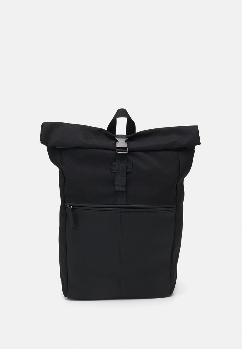 Black roll-top backpack made of textured fabric, featuring a front zip pocket, adjustable buckle closure, and top carry handle.