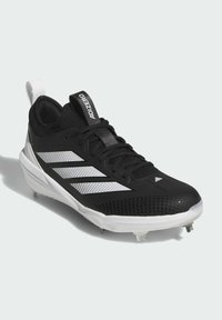 Black athletic shoe with a mesh upper, white stripe design, textured sole, and visible cleats for traction. Features a pull tab and laces.