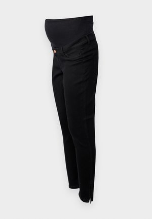 Jeans premaman neri con una cintura elastica sopra la pancia, vestibilità slim, zip alla caviglia e design classico a cinque tasche. Morbido tessuto di denim.
