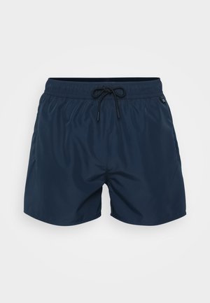 Temno modri kopalni šortki iz lahkotnega materiala, opremljeni z elastičnim pasom z vrvico in majhnim logotipom ob strani.