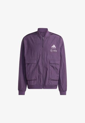 Purple bomber jacket made from lightweight material, featuring a zip front, two front pockets, ribbed cuffs, and logo accents.