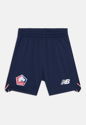 Jūras spēku sporta šorti ar elastīgu jostu, ar baltu New Balance logo un krāsainu sešstūra LOSC emblēmu uz kreisā kājas.