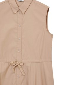 Vestito senza maniche beige con colletto, chiusura frontale con bottoni e dettagli con cintura. Realizzato in tessuto morbido e dalla vestibilità comoda.