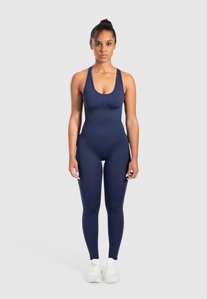 Navyblauwe bodysuit met een ronde hals en brede bandjes. Gemaakt van rekbaar materiaal, heeft het een aansluitende pasvorm en reikt tot aan de enkels.