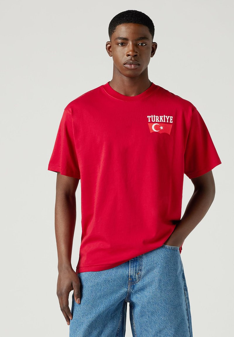Levi's® FOOTBALL FAN TEE UNISEX - Marškinėliai su spaudiniu - jester red
