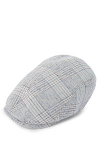Grijze geblokte pet met een zachte textuur, voorzien van een lichtblauw en bruin patroon. Rond gevormd met een iets verhoogde achterkant.