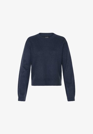 Tumši zili adīti svārki ar apaļu kakla izgriezumu, garām piedurknēm un īsu apakšmalu. Iezīmēts ar teksturētu rakstu un ribotiem akcentiem pie piedurknēm un apakšmalas.