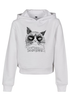 Vit kortärmad hoodie med en svart och vit illustration av en katts ansikte, med en dragsko på huvan och ribbade muddar.