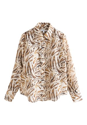 Chemise à manches longues boutonnée avec un motif rayures de tigre marron et beige sur fond blanc, dotée d'un col classique et de manches à poignets.