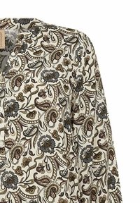 Langsleeve blouse met een crèmekleurige achtergrond en intrigerende bruine en blauwe bloem- en paisleypatronen; knoopsluiting bij de hals.