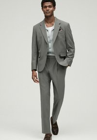 Next RELAXED FIT MOTIONFLEX - Habitbukser - green