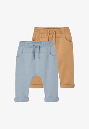 Two pairs of toddler pants, one light blue and one tan, both with elastic waistbands, drawstrings, front pockets, and rolled cuffs.
