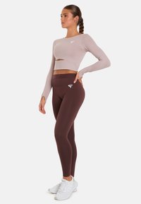SQUATPROOF HOLLOW OUT CROPPED  - Top dugih rukava - dark pink