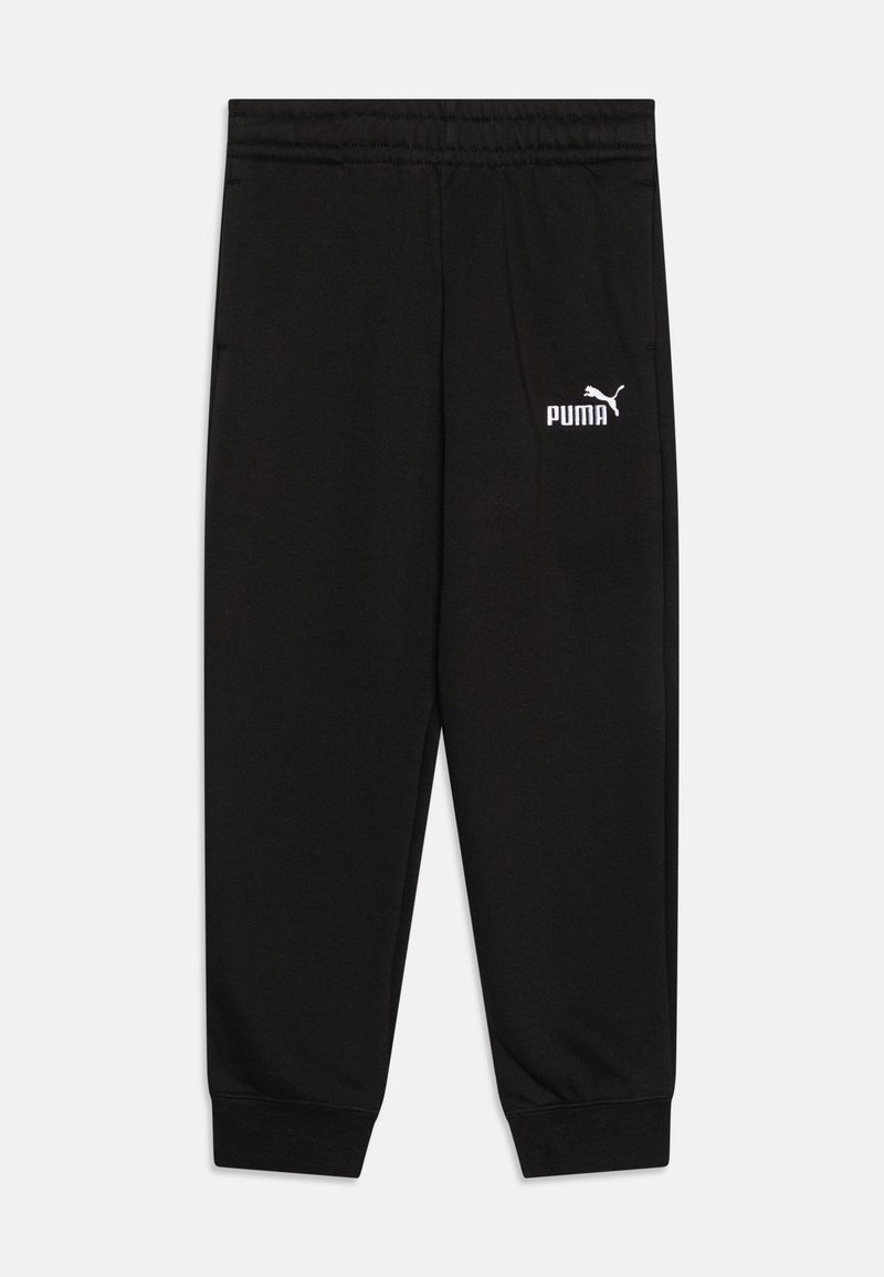 Pantalons de survêtement noirs en tissu doux, avec une taille et des poignets élastiques. Affiche un logo Puma blanc sur la cuisse gauche.