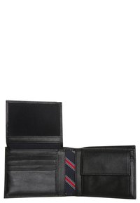 Black leather wallet with multiple card slots, a textured interior, and a blue fabric lining featuring red and white stripes.