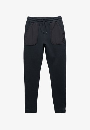 Schwarze Jogginghosen aus strukturiertem Stoff, mit zwei kontrastierenden schwarzen Vordertaschen und einem elastischen Bund mit Kordelzug.