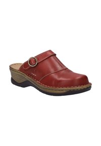 Red leather clog with a rounded toe, a decorative strap featuring a metal ring, and a curved wooden-textured sole.