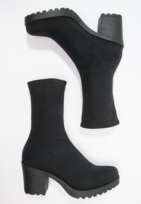 Vagabond Botines con plataforma - black