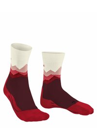 Rote und weiße Sportsocken mit einem grafischen Bergmotiv, in schmaler Form, aus weichem Material und mit verstärkten Zehen- und Fersenbereichen.